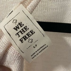 Oversized drape light cotton sweater.Very light pink color, with back tie detail